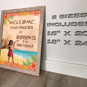 May include: Framed birthday sign with the text "WELCOME, WAYFINDERS to ROBIN'S 2ND BIRTHDAY." The sign features a cartoon illustration of a girl on a beach. The frame is light brown. The sign includes two size options: 16" x 20" and 18" x 24".