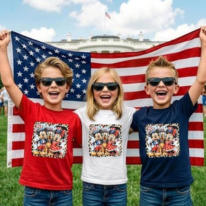 Three children are standing in front of an American flag, each holding a flag. They are wearing sunglasses and are smiling.