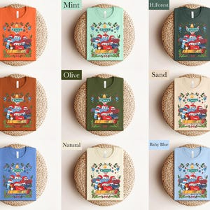 The image is a collage of nine different t-shirt designs, each with a unique color and pattern. The t-shirts are displayed on a woven basket, creating a visually appealing arrangement.