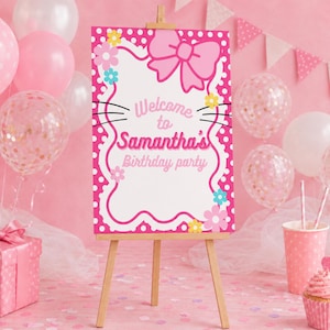 Peut inclure: Une pancarte rectangulaire de bienvenue pour une fête d'anniversaire sur un chevalet en bois, avec une bordure à pois roses et blancs, un grand nœud rose, des moustaches de chat et des fleurs colorées. Le texte indique Welcome to Samantha's Birthday party.