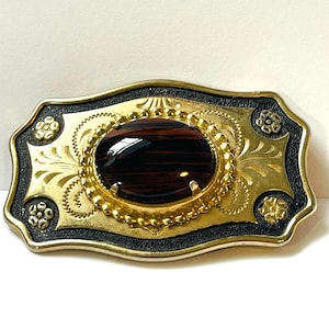 Vintage Western chic belt buckle, gold and black, floral frame, stone center