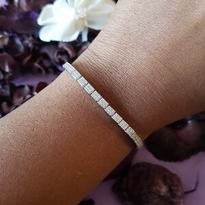 Sterling silver bola bracelet with Cubic Zirconia pave stones.
