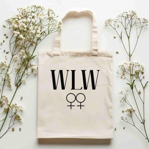 Women Loving Womenトートバッグ、WLWキャンバストート、LGBTQプライドショルダーバッグ、女性エンパワーメントトート、ガールフレンドギフトエコフレンドリーハンドバッグ
