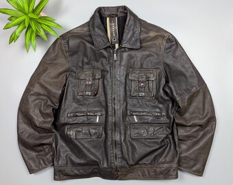 TRAPPER Manila Chaqueta de motociclista vintage de cuero marrón con múltiples bolsillos para hombre, talla 56 XL