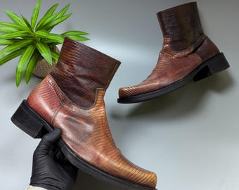 Illustration vectorielle d'une botte de cow-boy | Vecteur Premium