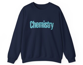 This crewneck soft sweatshirt is the perfect gift for your favorite Chemistry teacher. Chemistry block letters with teacher in cursive.