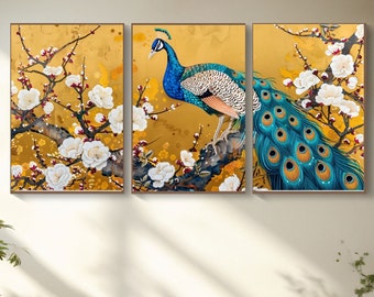 May include: A three-piece canvas print set featuring a blue and green peacock with a long tail, perched on a branch of a flowering tree with white blossoms. The background is a gold colour.