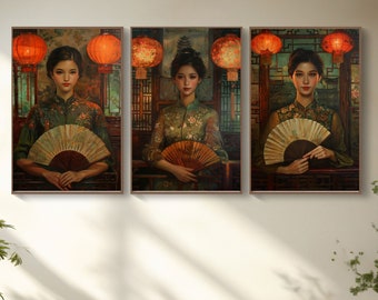 May include: Three framed paintings of women in traditional Chinese clothing holding fans. Each painting features a woman with dark hair and a green and gold patterned dress. The paintings are set against a background of red lanterns and a dark green foliage.