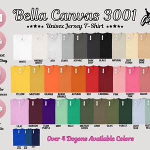 May include: Bella Canvas 3001 Unisex Jersey T-Shirt in over 4 dozen colors. The image shows a variety of colors, including white, yellow, orange, red, pink, green, blue, and purple.
