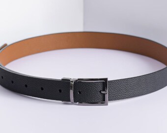 Highlight the versatility of leather belts that can be worn for both formal and casual occasions.