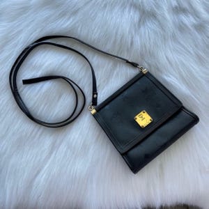 1990s MCM mini crossbody purse. Retro and Rare Collection.