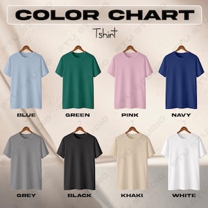 May include: Color chart of t-shirts in various colors, including blue, green, pink, navy, grey, black, khaki, and white. Each t-shirt is displayed on a wooden hanger.
