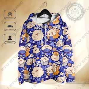 May include: A blue hoodie with a repeating pattern of cartoon characters, white flowers, and small blue flowers. The hoodie is hanging on a black hanger. The hoodie has a white drawstring and a white interior lining in the hood.