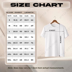 May include: A white t-shirt hangs on a wooden hanger, next to a size chart. The chart displays chest and length measurements in inches and centimeters for sizes S to 5XL. The text "SIZE CHART" is at the top.