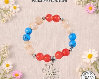 May include: A beaded bracelet with red, blue, and cream-colored beads. The bracelet has a silver flower charm and the text "Summer Bloom Bracelet". The background includes flowers and the text "Urban Style Essentials".