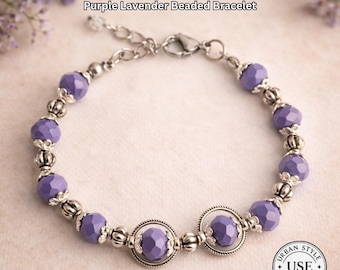 May include: A purple lavender beaded bracelet with silver-toned accents. The bracelet features faceted lavender beads and decorative silver-toned beads. The text "URBAN STYLE ESSENTIALS" and "Purple Lavender Beaded Bracelet" are visible.