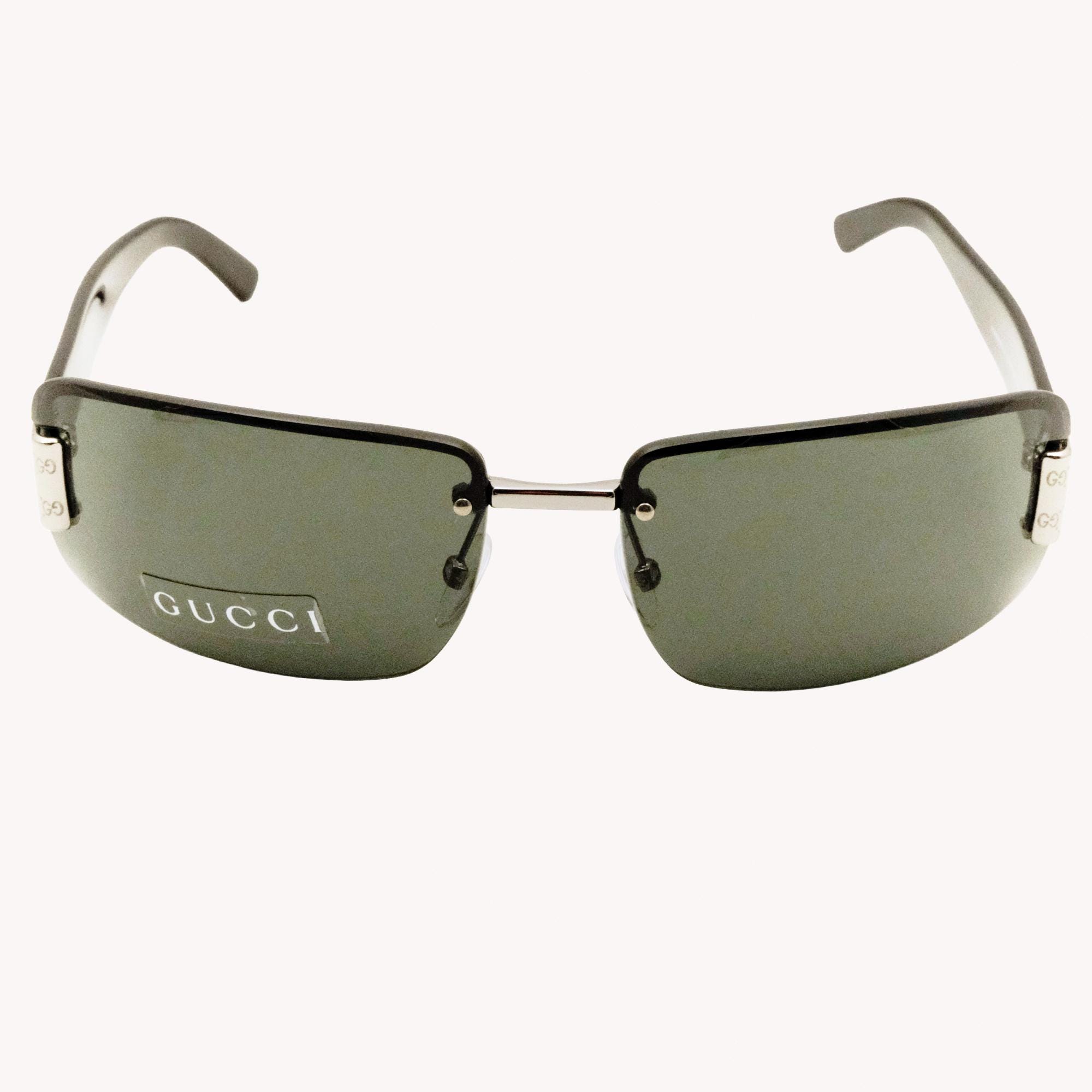 Gucci GG1797/S Black Rimless Shield Sunglasses With Green Lenses