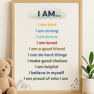 Puede incluir: Un póster enmarcado con el texto "Kids Affirmation Poster" y "Instant Digital Download 8.5 x 11 in." El póster presenta las palabras "I AM..." encima de una lista de afirmaciones positivas en varios colores, incluyendo "I am kind" y "I am loved."