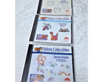 Collezione di 3 disegni da ricamo Dakota Collectibles CD 970304 970225 970252