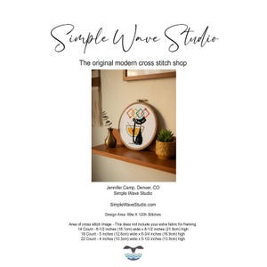May include: A cross-stitch embroidery hoop with a black cat design and geometric shapes. The text "Simple Wave Studio" and "The original modern cross stitch shop" are displayed. The design area is 89w x 120h stitches.