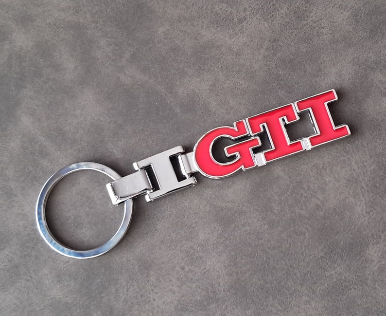Vauxhall Car Logo Metal Keyring - Silver & Black With Free Red Velvet Gift Pouch (S3)