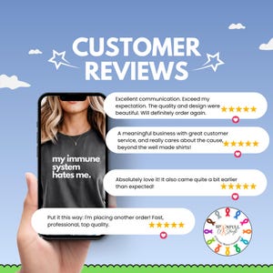 May include: A smartphone displays a customer review graphic against a blue sky background. The phone shows a dark gray t-shirt with the text "my immune system hates me." Customer reviews include five-star ratings and positive comments.
