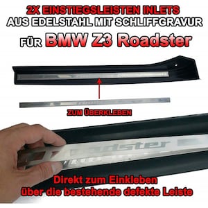 Könnte beinhalten: Edelstahl-Einstiegsleisten-Inlays für einen BMW Z3 Roadster. Die Inlays haben eine geschliffene Oberfläche und das Wort "Roadster" ist sichtbar. Der Text "2X EINSTIEGSLEISTEN INLETS" befindet sich oben im Bild.