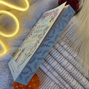 The Wisteria Society of Lady Scoundrels sprayed edges | Painted Book Edges | Custom painted books
