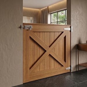 May include: A wooden Dutch door with a classic X-brace design. The door is made of light brown wood and features a metal latch and hinges. The door is set in a neutral-toned wall, creating a rustic and inviting aesthetic.