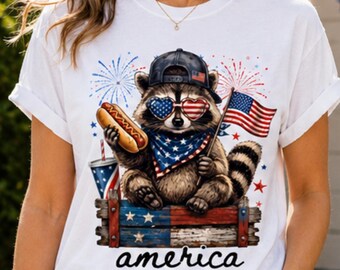 America Raccoon 4th of July T-Shirt | Patriotic Funny Raccoon Tee | Independence Day Shirt | USA Fourth of July Gift | Unisex Summer Tee