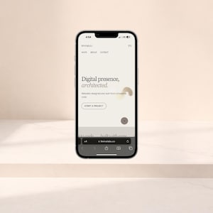 May include: A smartphone displays a website with the text "Digital presence, architected." The website's design is minimalist, featuring a light background and a call to action button labeled "START A PROJECT."