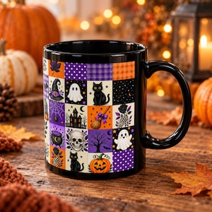 May include: A black ceramic mug featuring a colourful patchwork grid design with Halloween-themed illustrations including ghosts, black cats, a witch hat, a skull, a pumpkin, a haunted house, a broomstick, and purple polka dot patterns.