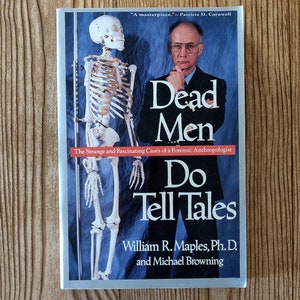 May include: Book cover with a blue background featuring a skeleton and a man in a suit. The title is "Dead Men Do Tell Tales: The Strange and Fascinating Cases of a Forensic Anthropologist" by William R. Maples, Ph.D. and Michael Browning.