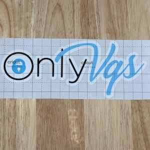 May include: A white Cricut transfer tape sheet with the words "Only Vgs" in black and light blue. The word "Only" is in a bold, stylized font. The Cricut logo is visible.