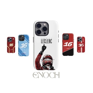 May include: A selection of phone cases with racing designs. The cases feature the number "16" and the name "Charles Leclerc". The central case shows a driver in a red racing suit with his arm raised. The brand name "ENOCH" is at the bottom.