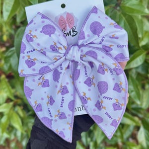 May include: A rustic wooden sign with the text "Welcome to our home" in white lettering. The sign features a distressed finish and a simple, inviting design, perfect for entryway decor.