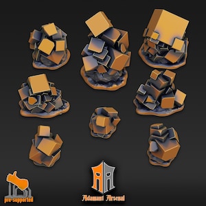 May include: Nine different sized piles of gold-colored, cube-shaped crystals. The crystals are arranged on a dark background.