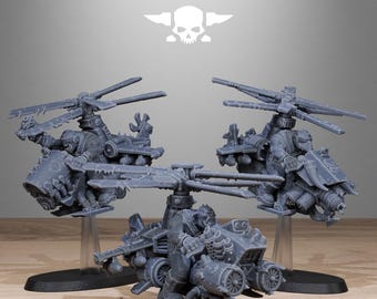 May include: Three grey miniature helicopters with detailed mechanical designs. Each helicopter has a rotor, a cockpit, and various weapon attachments. The image includes the text "STATIONFORGE" and a skull logo.