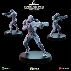 May include: Three gray miniature figurines of futuristic soldiers in combat poses, each holding a rifle. The figures are on black circular bases. The text "QUALITY ASSURANCE PROFESSIONALLY PRE-SUPPORTED PRINT TESTED" is at the top.