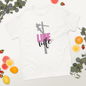 Line Wife T-Shirt -- Lineman Wife Shirt, Blue Collar Wife Tee, Utility Worker Spouse Gift, Pink & Black Text with Gray Lineman Silhouette