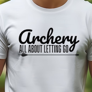 May include: White t-shirt with black text that reads "Archery All About Letting Go" and a black arrow pointing to the right.