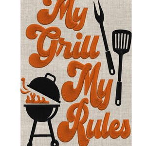May include: Embroidered design on a beige fabric. The text "My Grill My Rules" is in orange, stylized lettering. A black grill, spatula, and fork are also featured. The design is suitable for grilling enthusiasts.