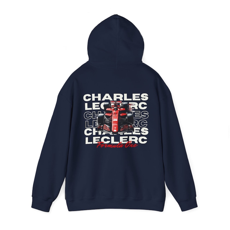 May include: Navy blue hooded sweatshirt with a white graphic of a Formula One race car and the text "CHARLES LECLERC Formula One" repeated multiple times.