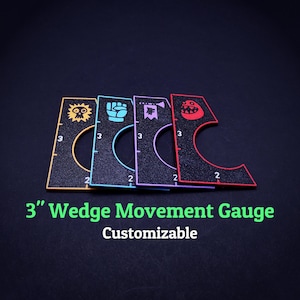 May include: Four colorful 3-inch wedge movement gauges with unique icon designs. Each gauge has a curved cutout and is marked with numbers 2 and 3. The text "3" Wedge Movement Gauge Customizable" is displayed below the gauges.