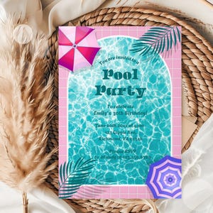May include: Pink and blue pool party invitation with a graphic of a swimming pool, palm leaves, and umbrellas. The text reads "You are invited to a Pool Party to celebrate Emily's 30th Birthday! June 20th 20xx at 4 pm 123 Giggle Ave, Richmond, VA 22548 Please RSVP to Mandy at 123.456.6789"