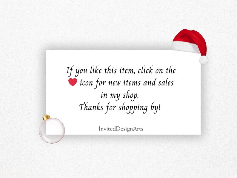 May include: A white card with text, a red heart icon, and a Santa hat. The text reads: "If you like this item, click on the icon for new items and sales in my shop. Thanks for shopping by!" A clear ornament is in the lower left.