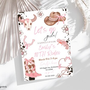 May include: A pink and white invitation for a 10th birthday rodeo party. The invitation features a cowboy hat, boots, and a lasso. The text on the invitation reads "Let's go girls! Saddle up for Emily's 10th Rodeo".