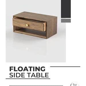 Puede incluir: Una mesa auxiliar flotante de madera con un cajón y un estante. La mesa tiene un acabado de madera natural y una perilla dorada en el cajón. La mesa se muestra sobre un fondo blanco.  www.youtube.com/@windfirewoodwork Wind & Fire Woodwork