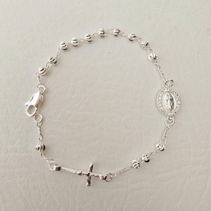 Pulsera de decenios con rosario de cruz de la Virgen bañada en plata
