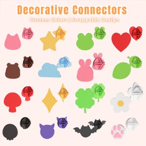 May include: A collection of Decorative Connectors with a swappable design, featuring various shapes including hearts, stars, clouds, flowers, and animal silhouettes in multiple colours like red, yellow, blue, green, pink, brown, and black.